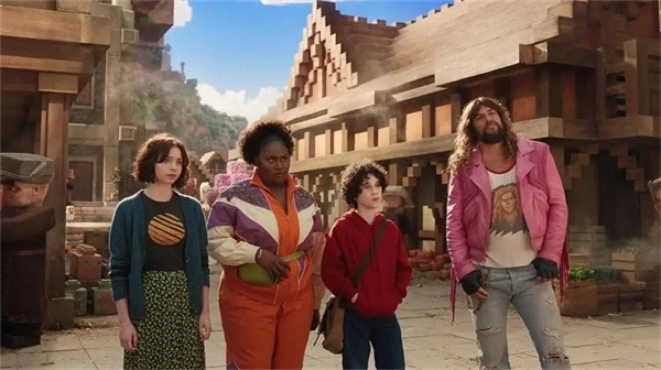 Characters in "A Minecraft Movie" in a blocky village.