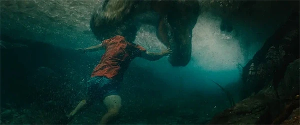 A person having an underwater encounter with a dinosaur in "Jurassic World: Rebirth".