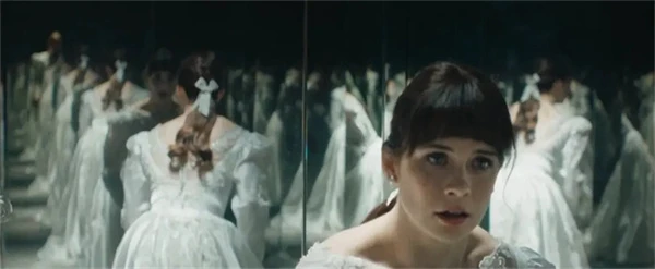Woman in mirror maze in "The Conjuring: Last Rites" looks startled.