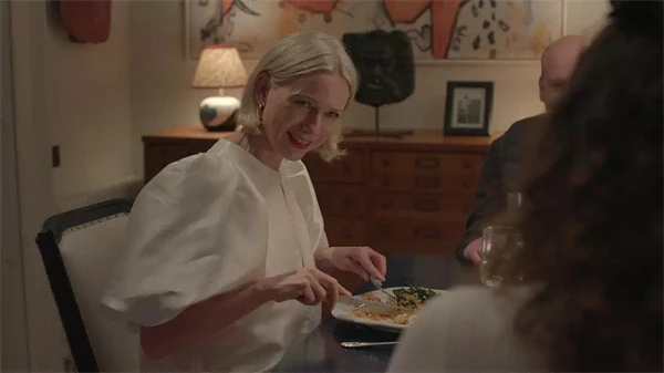 A woman is enjoying a meal in "Too Much".