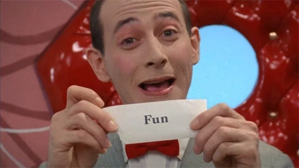 Pee-wee holds a note saying "Fun" in "Pee-Wee as Himself".
