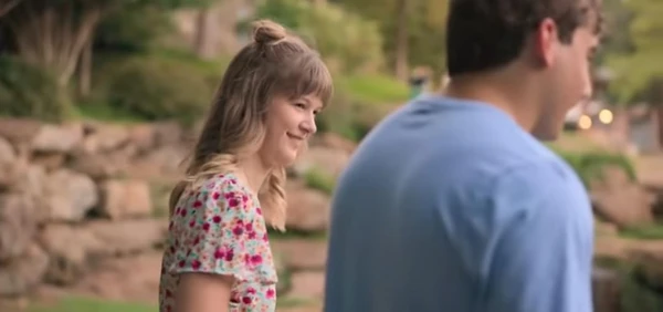 A woman smiles at a man outdoors in "Love on the Spectrum U.S".